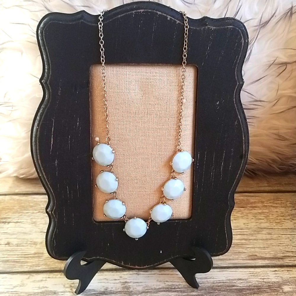 Elegant Gold and White Necklace